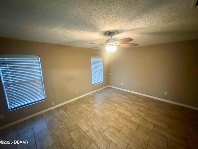 528 Crooked Stick Dr, Daytona Beach, FL 32114 - unfurnished room featuring a ceiling fan and a textured ceiling