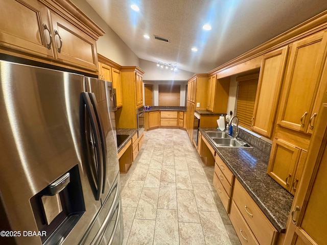 528 Crooked Stick Dr, Daytona Beach, FL 32114 - kitchen with stainless steel appliances, lofted ceiling, recessed lighting, stone tile flooring, and a textured ceiling