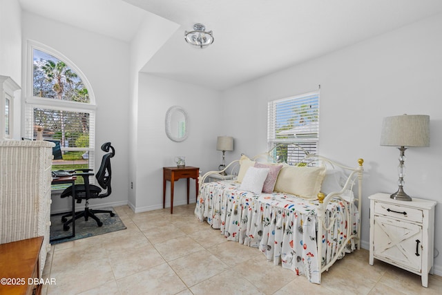 bedroom featuring light tile patterned floors