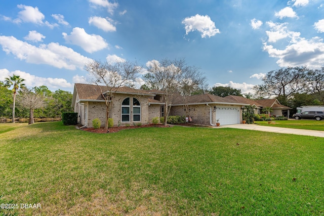 ranch-style home with a garage and a front yard