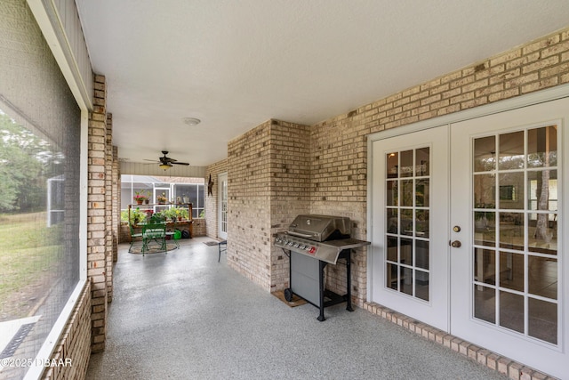 view of patio / terrace featuring a grill, ceiling fan, and french doors