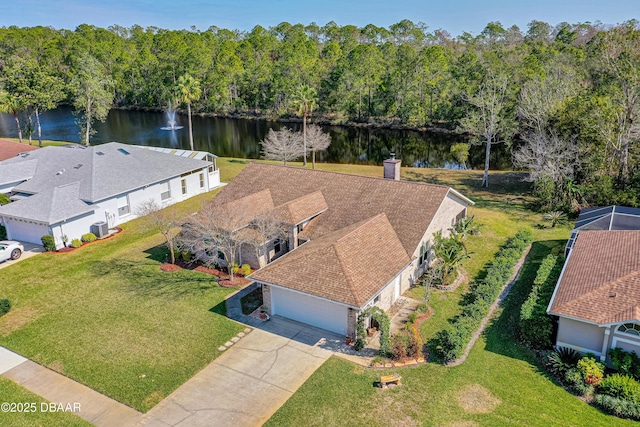 birds eye view of property featuring a water view