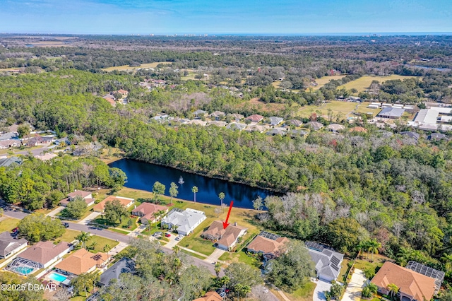 birds eye view of property featuring a water view