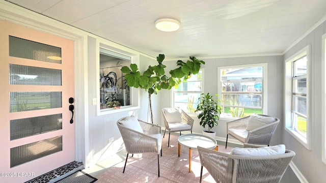 70 Ocean Shore Dr, Ormond Beach, FL 32176 - sunroom / solarium featuring ornamental molding and baseboards