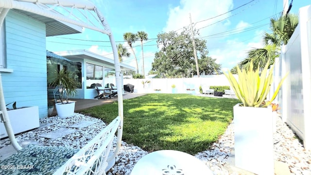 70 Ocean Shore Dr, Ormond Beach, FL 32176 - view of yard featuring a patio area