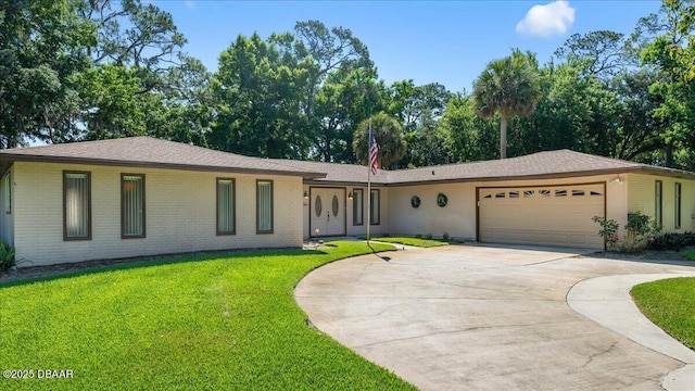 single story home featuring a garage and a front lawn