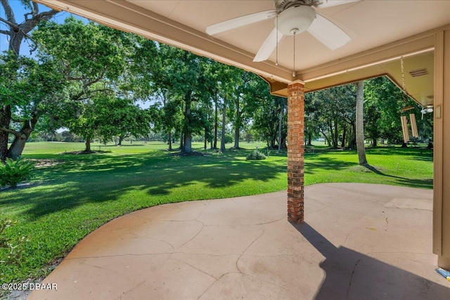 view of patio featuring ceiling fan