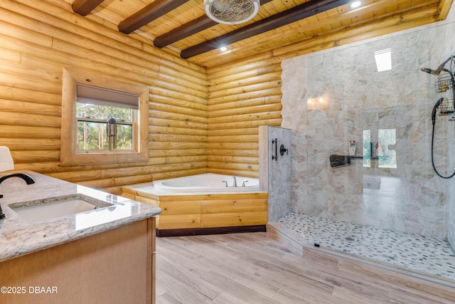 full bath featuring tiled shower, wooden ceiling, wood finished floors, beamed ceiling, and a garden tub