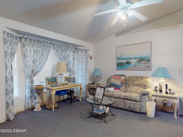 carpeted office with ceiling fan and vaulted ceiling