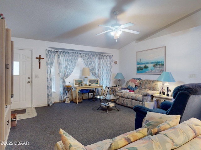 living area featuring a ceiling fan, plenty of natural light, carpet, and vaulted ceiling