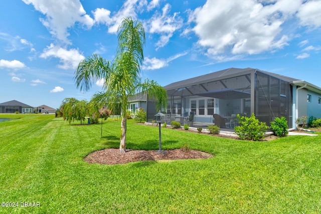 view of yard featuring a lanai