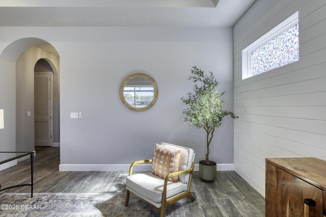 sitting room featuring hardwood / wood-style flooring and ceiling fan