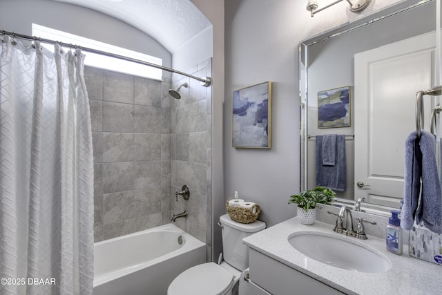 full bathroom featuring shower / bath combination with curtain, vanity, and toilet