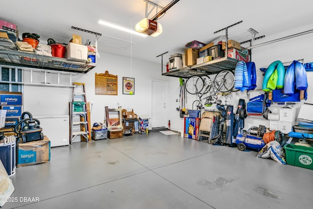 garage featuring a garage door opener