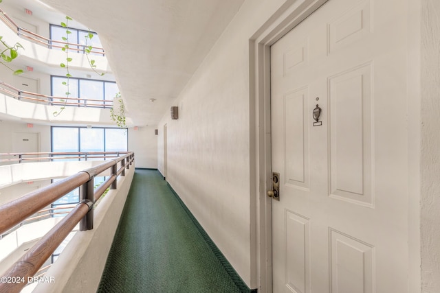 doorway to property featuring a balcony