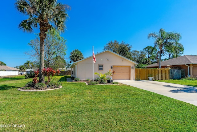 view of side of property featuring driveway, a garage, a lawn, fence, and stucco siding