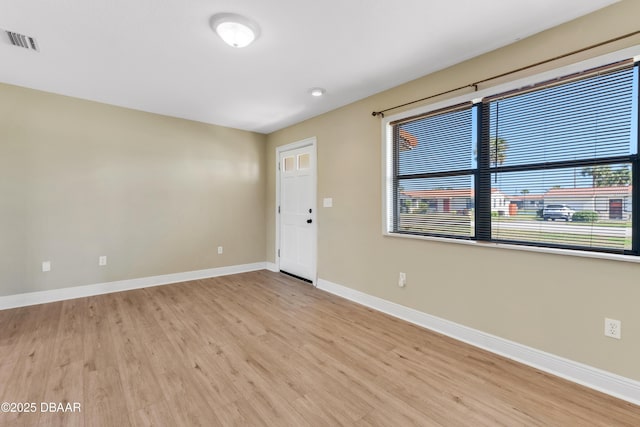 empty room featuring light hardwood / wood-style floors