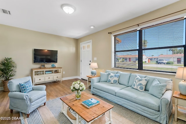 living room featuring light wood-type flooring