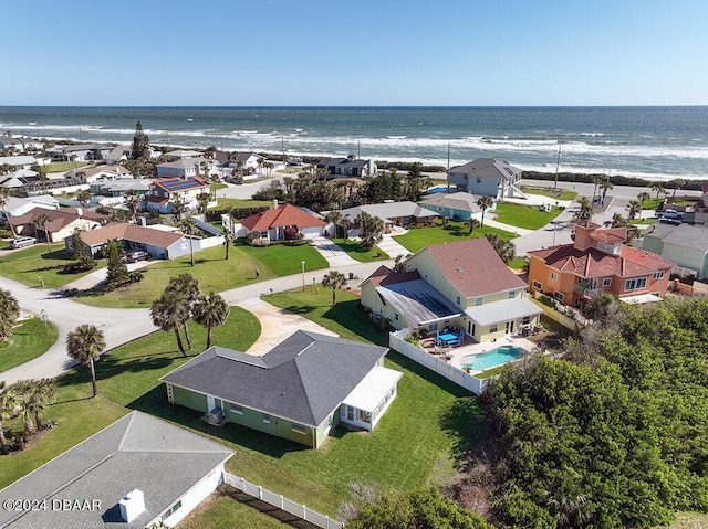 aerial view with a view of the beach and a water view