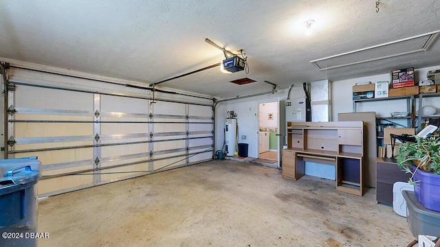 garage with a garage door opener and water heater