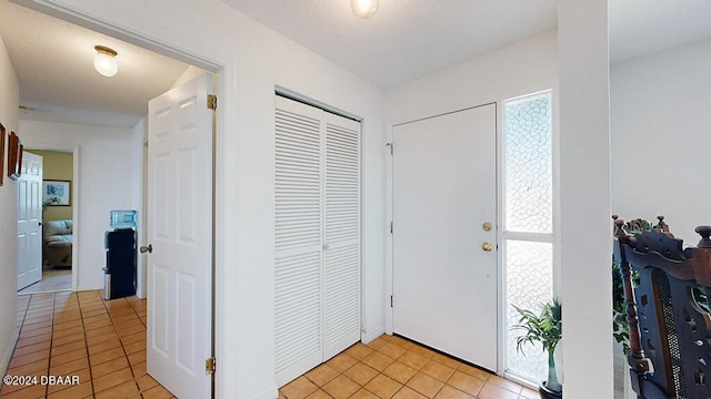 view of tiled entrance foyer