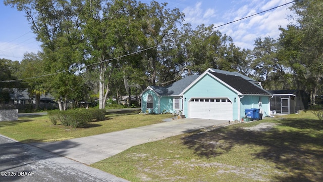 view of front facade featuring a garage and a front yard