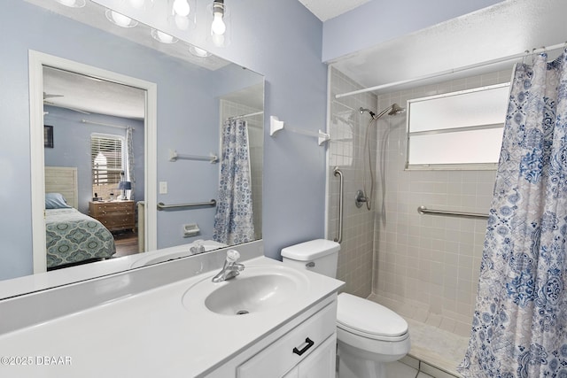 bathroom with toilet, vanity, a shower with curtain, and a wealth of natural light