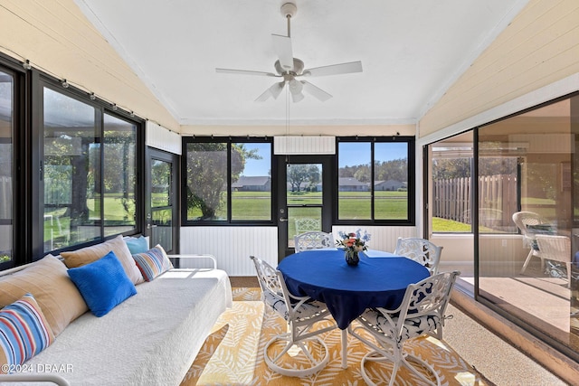 sunroom with an outdoor hangout area, a ceiling fan, and a wealth of natural light