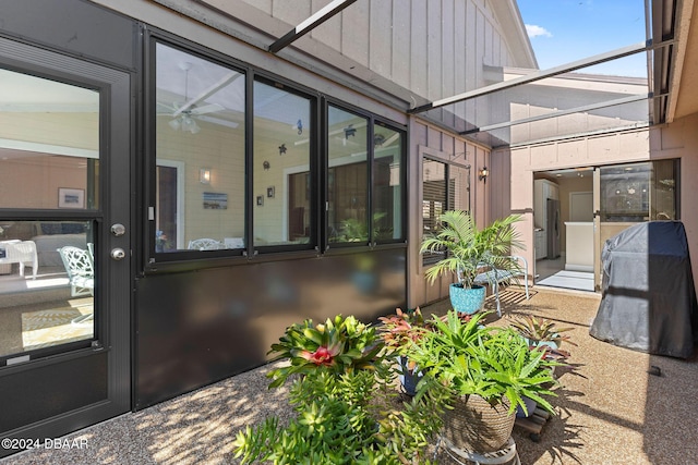 doorway to property featuring board and batten siding