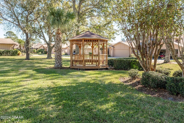 view of yard with a gazebo and a residential view