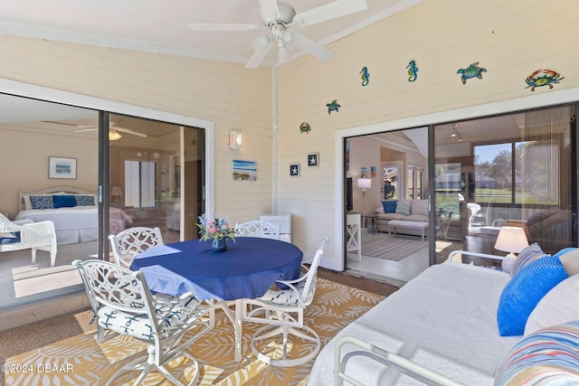 view of patio / terrace featuring outdoor lounge area, outdoor dining space, and a ceiling fan