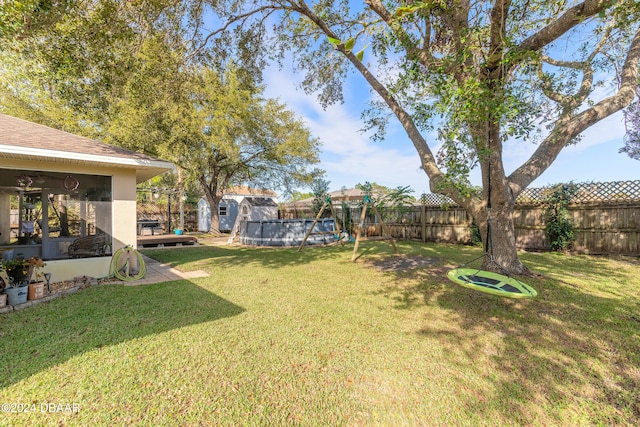 view of yard with a sunroom