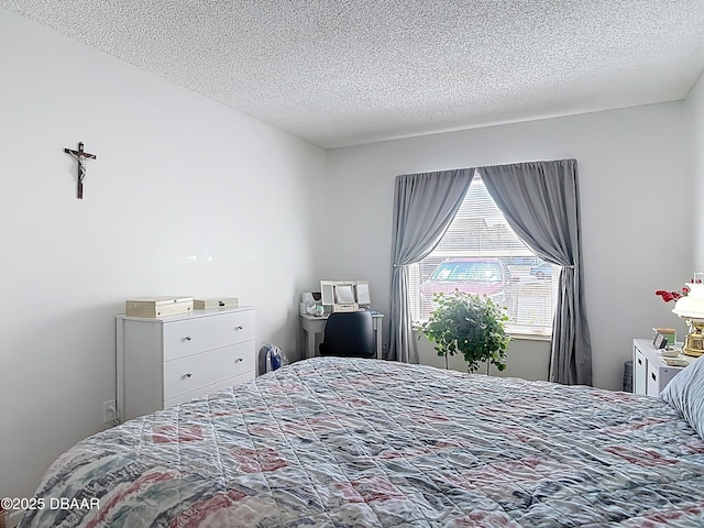 420 Banana Cay Dr Unit A, South Daytona, FL 32119 - bedroom featuring a textured ceiling