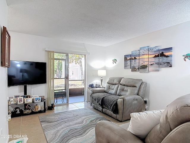 420 Banana Cay Dr Unit A, South Daytona, FL 32119 - living area with a textured ceiling and light tile patterned flooring