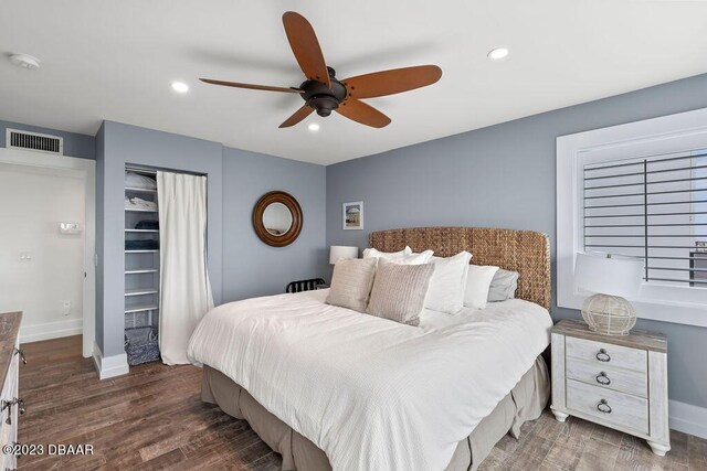 bedroom featuring recessed lighting, baseboards, ceiling fan, visible vents, and wood finished floors