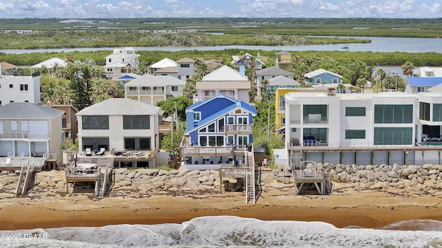 bird's eye view with a water view and a residential view