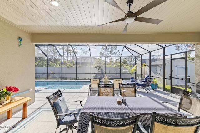 view of patio / terrace featuring an outdoor hangout area, a lanai, and a fenced in pool