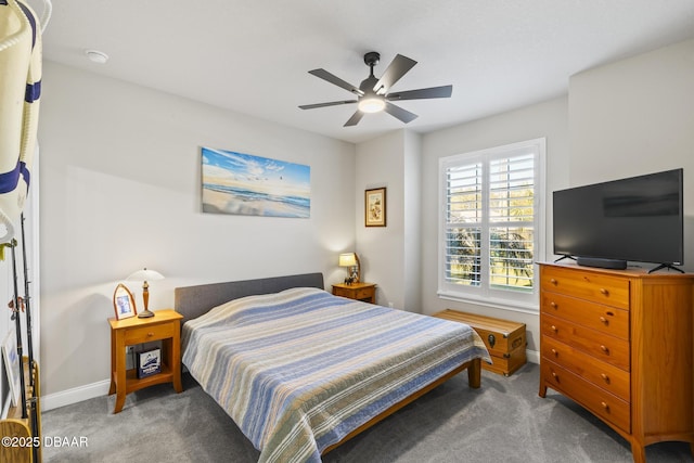 bedroom featuring ceiling fan and carpet flooring