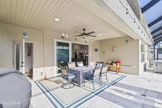 view of patio with ceiling fan