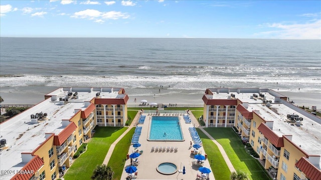 bird's eye view featuring a beach view and a water view