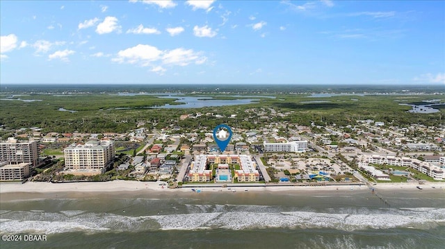 bird's eye view featuring a view of the beach and a water view