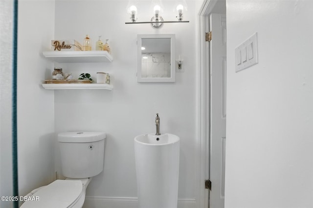 bathroom featuring toilet