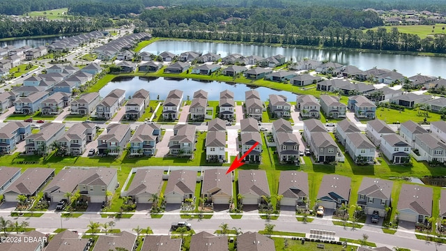 birds eye view of property featuring a water view