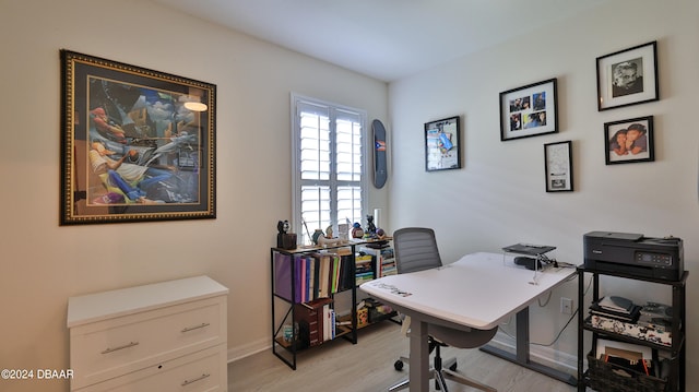 office area with light hardwood / wood-style flooring