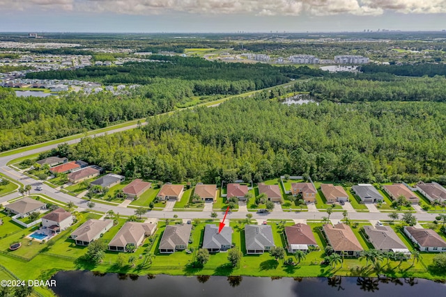 birds eye view of property featuring a water view