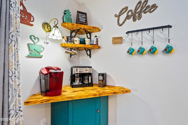 bar featuring wood counters