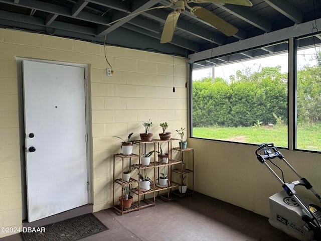 sunroom featuring lofted ceiling