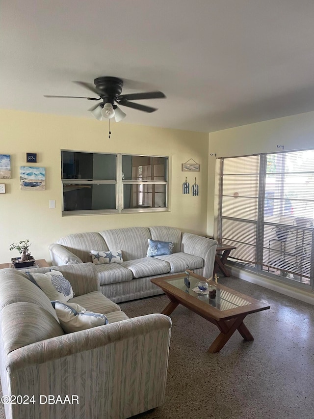 living room with ceiling fan