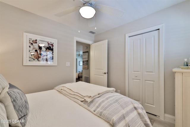 bedroom featuring a closet and ceiling fan