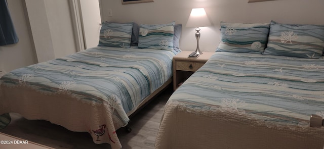 bedroom featuring hardwood / wood-style flooring